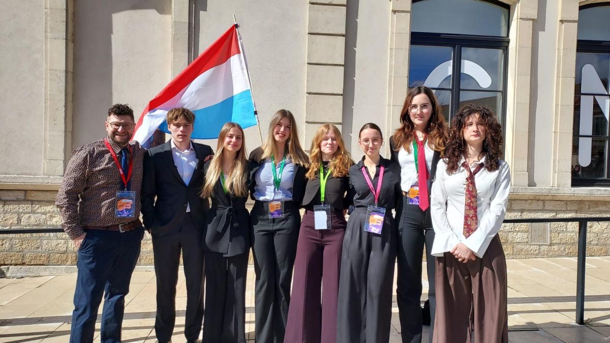 LMRL delegation at Chau'MUN 2026 with the Luxembourg flag